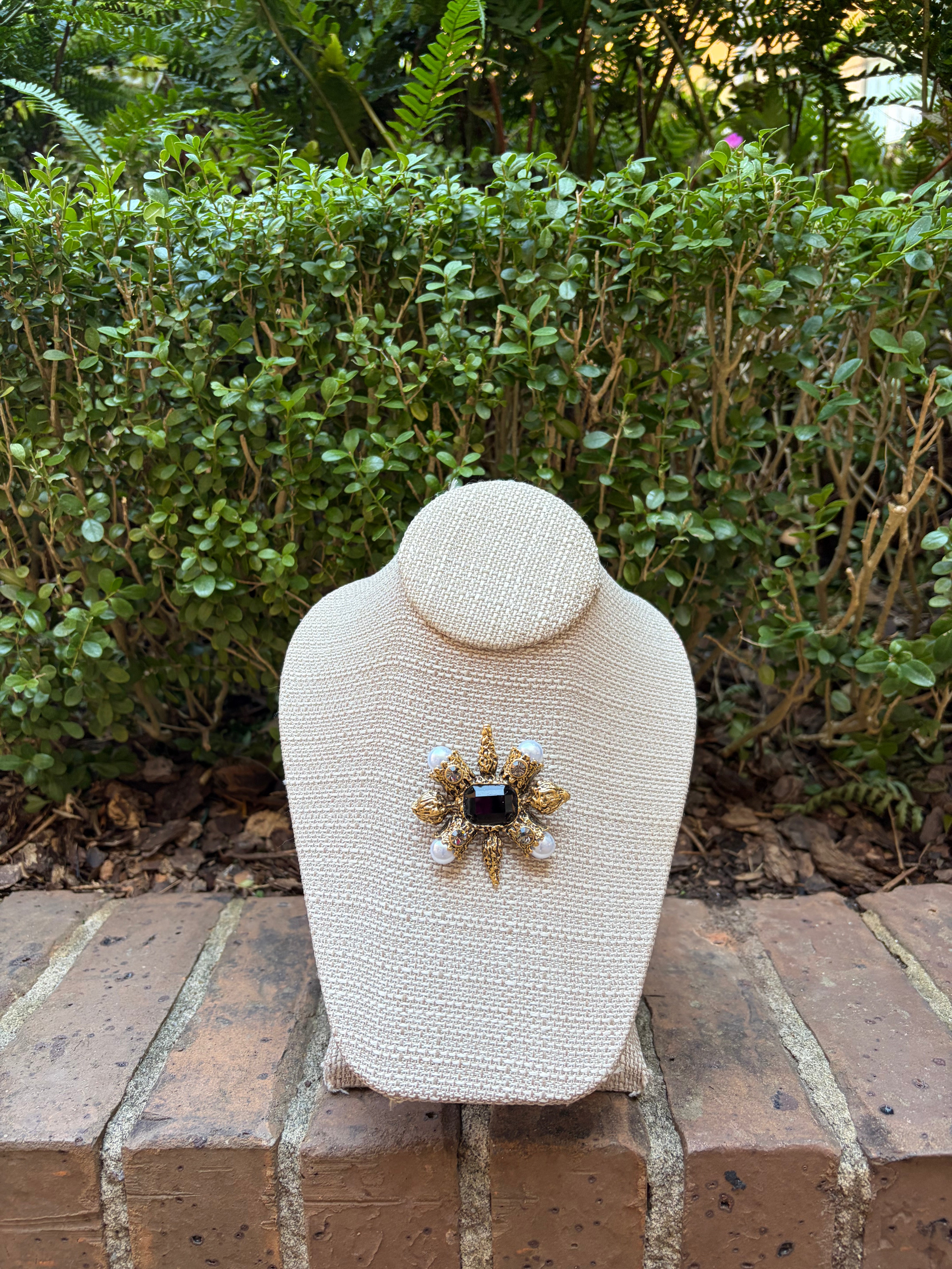 Gold detail brooch
