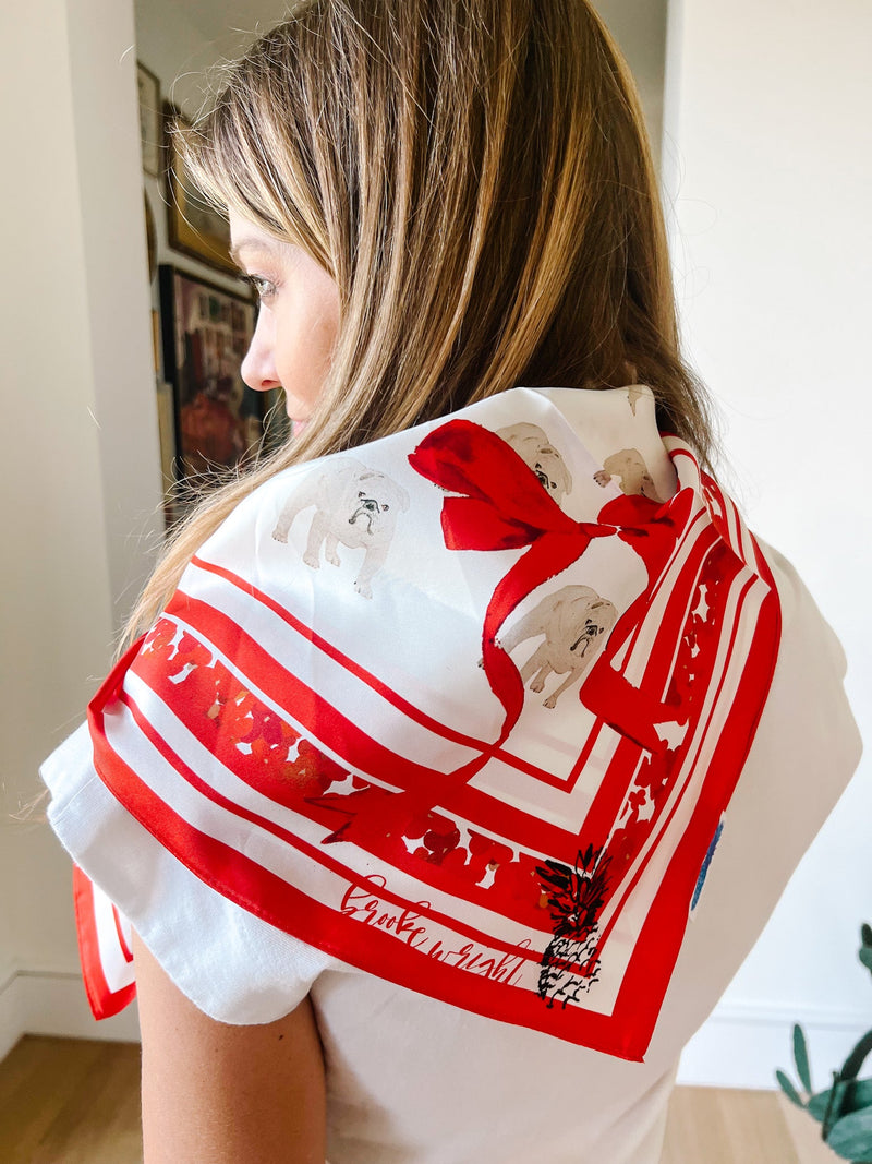 White Bulldog With Red Scarf