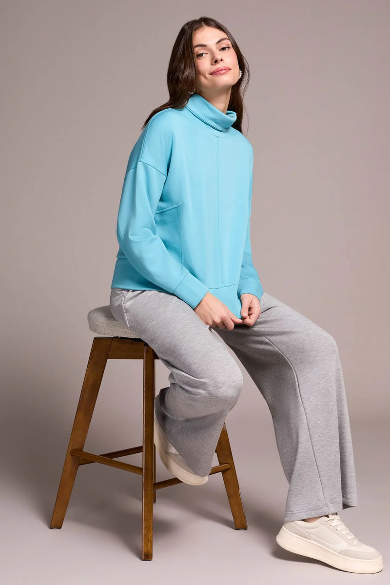 Techno Lux Drop Shoulder Funnel Neck Knit Top